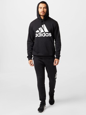 ADIDAS SPORTSWEAR Αθλητική μπλούζα φούτερ 'Essentials' σε μαύρο