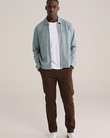 WE Fashion - Regular Calças chino em castanho