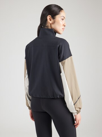Giacca sportiva 'Unstoppable' di UNDER ARMOUR in nero