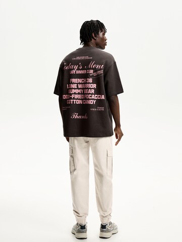 Effilé Pantalon cargo Bershka en beige