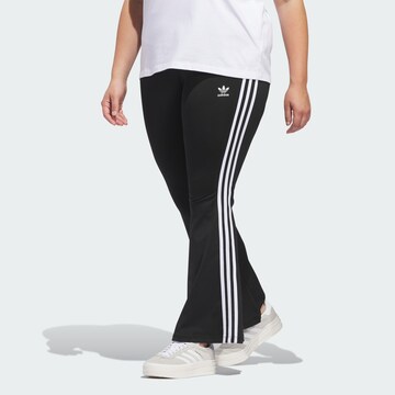 ADIDAS ORIGINALS Flared Leggings in Black: front