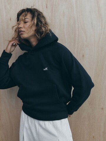Sweat-shirt self. en noir