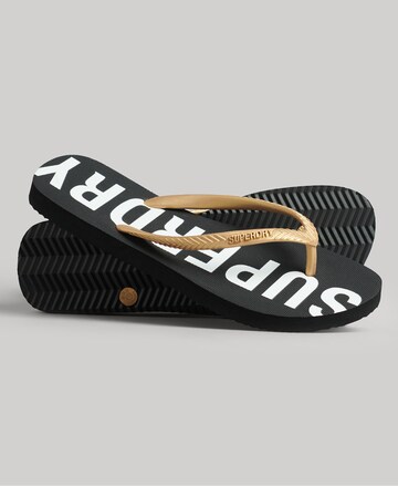 Superdry T-Bar Sandals in Gold