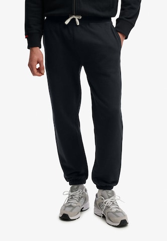 Superdry & Co Tapered Pants 'Essential' in Black: front