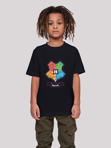 T-Shirt 'Harry Potter Junior Hogwarts Crest Color' F4NT4STIC en noir : devant