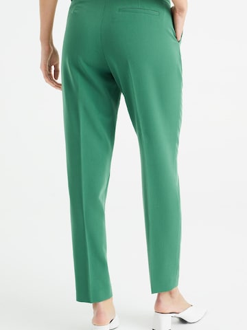 Coupe slim Pantalon à plis WE Fashion en vert