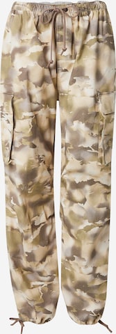 ruda Nike Sportswear Siaurėjantis Laisvo stiliaus kelnės: priekis