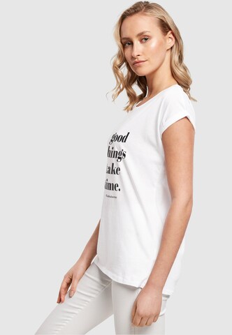 Merchcode T-Shirt 'Good Things Take Time' in Weiß