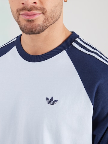 ADIDAS ORIGINALS Koszulka 'CALI' w kolorze niebieski