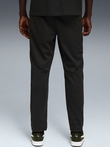 PUMA - regular Pantalón deportivo 'Puma Evostripe Warm Pants' en negro