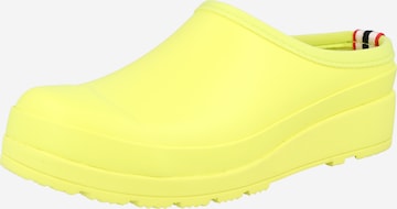 HUNTER Clogs in Yellow: front