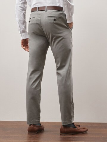 Slimfit Pantaloni chino di Next in grigio