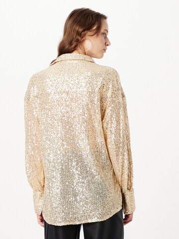 Misspap - Blusa en oro