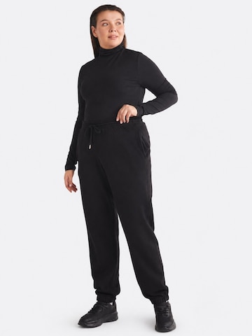 Ethiquet Sporthose‌‌‌ in Schwarz
