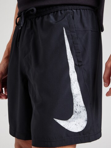 NIKE - Loosefit Pantalón deportivo 'Form Swoosh' en negro