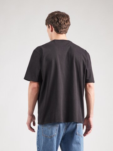 Maglietta di GUESS Originals in nero