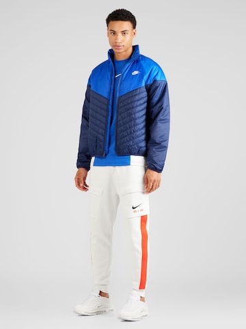 Nike Sportswear - Casaco meia-estação em azul