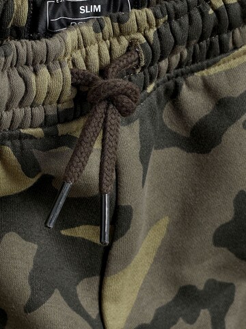 Tapered Pantaloni di Next in verde