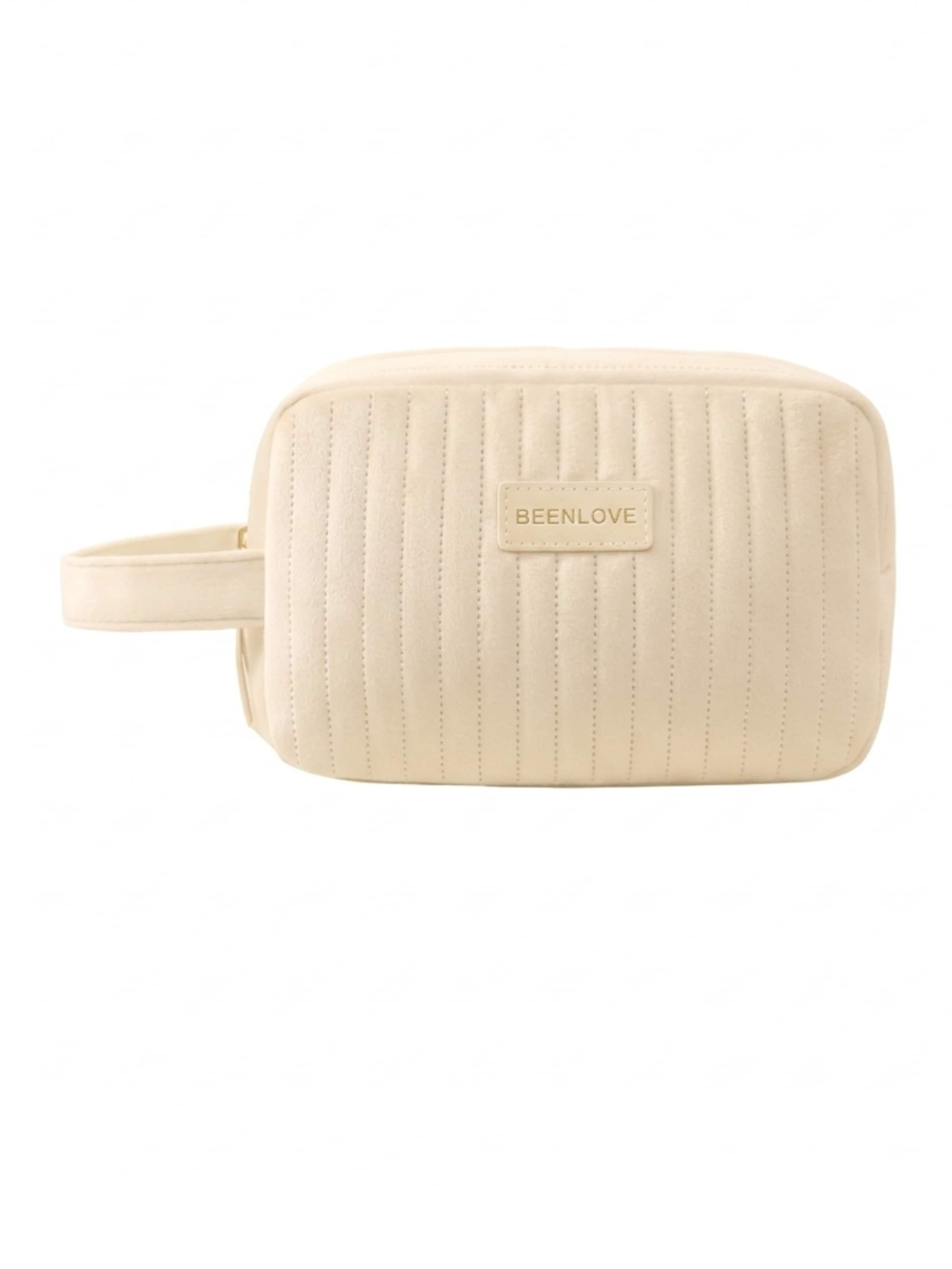 MEVYRA Cosmetic Bag in Beige: front