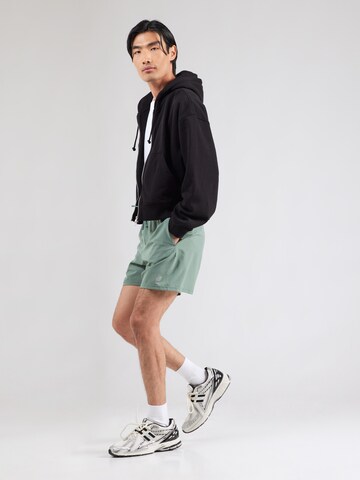 new balance Обычный Спортивные штаны 'Essentials' в Зеленый