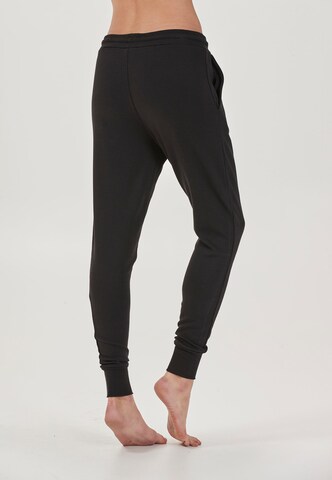 Athlecia Loosefit Sporthose in Schwarz