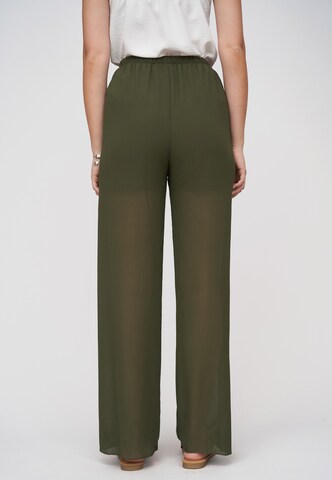 Wide leg Pantaloni di Cloud5ive in verde