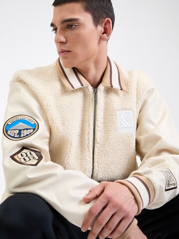 Karl Kani Tussenjas in Beige