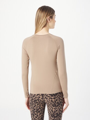 Maglia funzionale di Aim'n in marrone