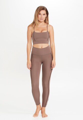 Athlecia Regular Workout Pants 'Brastine' in Brown