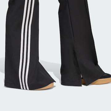 évasé Pantalon ADIDAS ORIGINALS en noir