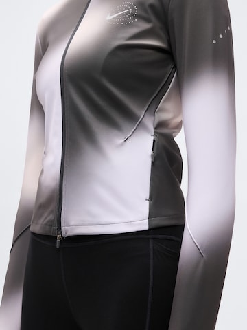 NIKE Sport szabadidős dzsekik - szürke