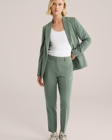 WE Fashion Slimfit Suorat housut värissä vihreä