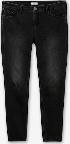 SHEEGO Skinny Jeans in Black: front