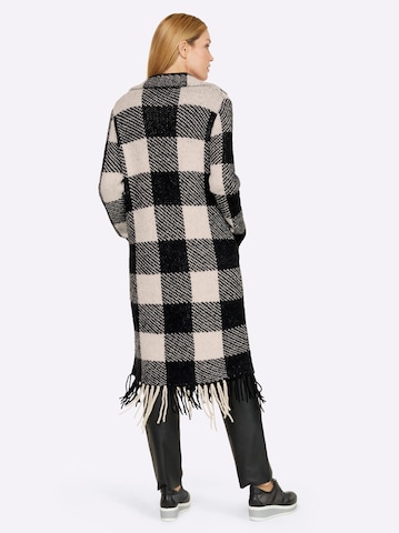 heine Knitted coat in Black