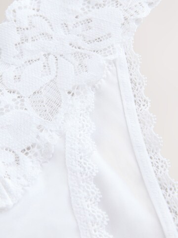 String Next en blanc