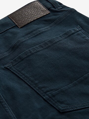 Next Slimfit Chino hlače 'Motion Flex' | modra barva