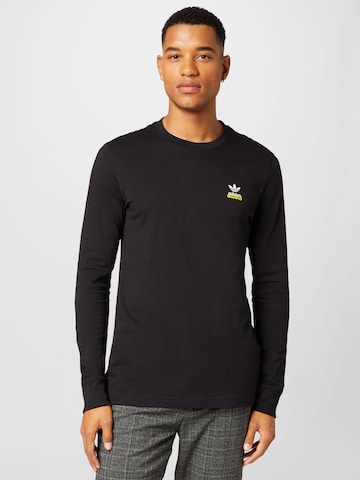 ADIDAS ORIGINALS - Camisa 'Graphics Unite' em preto: frente