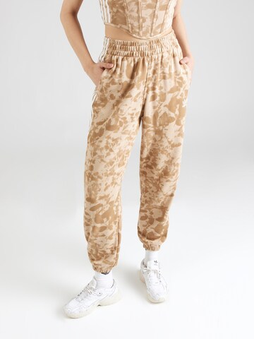 Effilé Pantalon ADIDAS ORIGINALS en beige : devant