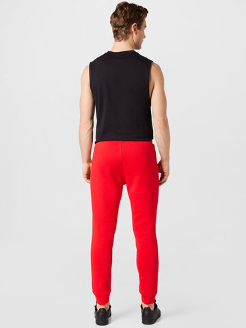 ADIDAS ORIGINALS Tapered Hose in Rot