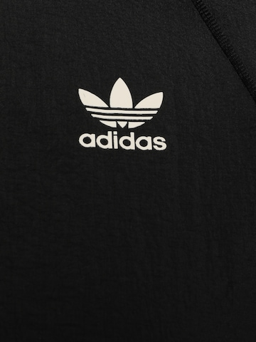 ADIDAS ORIGINALS Övergångsjacka i svart