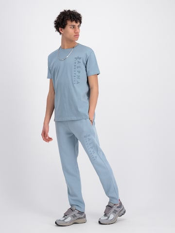 regular Pantaloni di ALPHA INDUSTRIES in blu