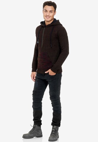 Rusty Neal Cooler Grobstrick-Pullover mit Kapuze in Rot