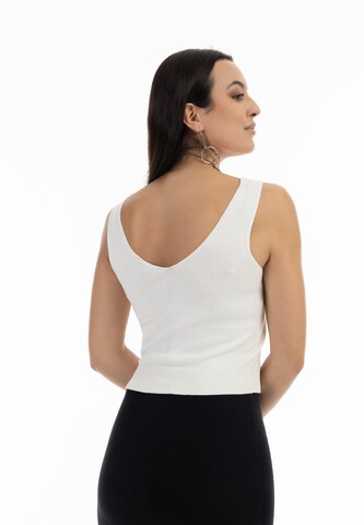 Top in maglia di faina in bianco