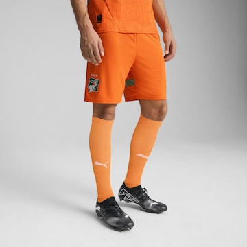 Regular Pantalon de sport PUMA en orange : devant