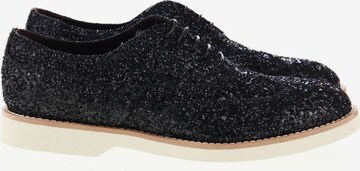 Doucal's Flats & Loafers in 38 in Black