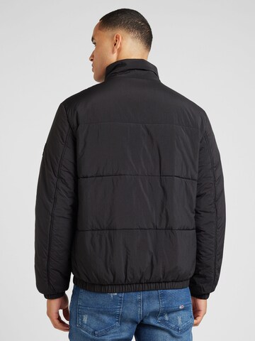 Tommy Jeans Tussenjas 'ESSENTIAL' in Zwart