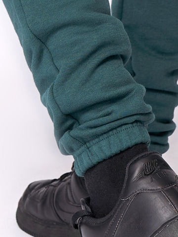 Coupe slim Pantalon de sport 'Essential Jogger' Fortex Fitness en vert