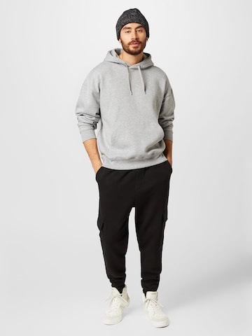 BURTON MENSWEAR LONDON Tapered Cargobroek in Zwart