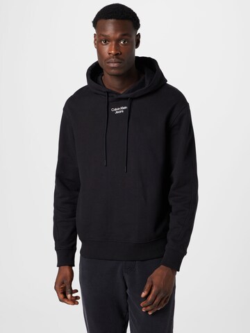 Sweat-shirt Calvin Klein Jeans en noir : devant