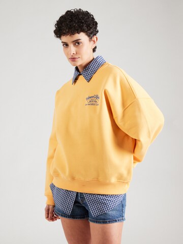 Sweat-shirt 'Island Radio' On Vacation Club en jaune